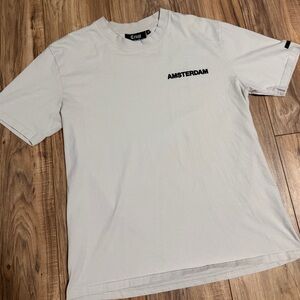 Trust Amsterdam Graphic T-Shirt - White / Cream color. Size XL